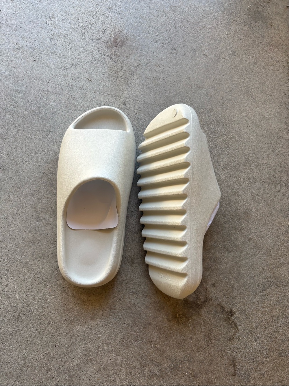 Yeezy Slide Sandals in Off-White/Cream